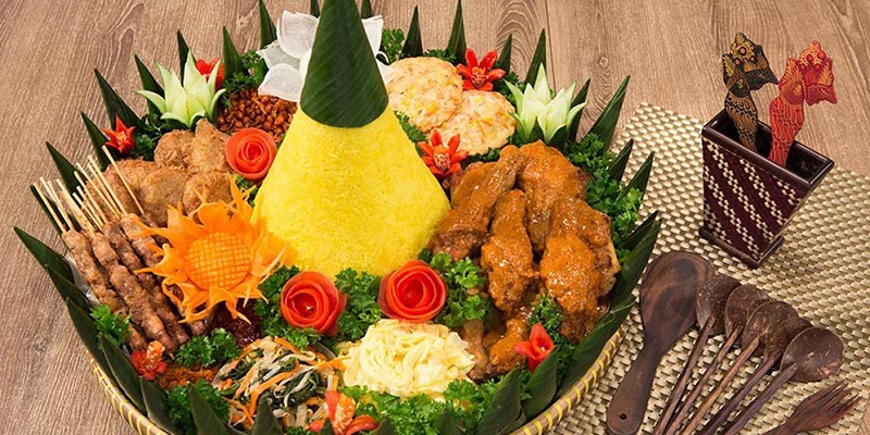THE UNIQUENESS OF ‘TUMPENG’ IS AN INDONESIAN CONE-SHAPED RICE DISH